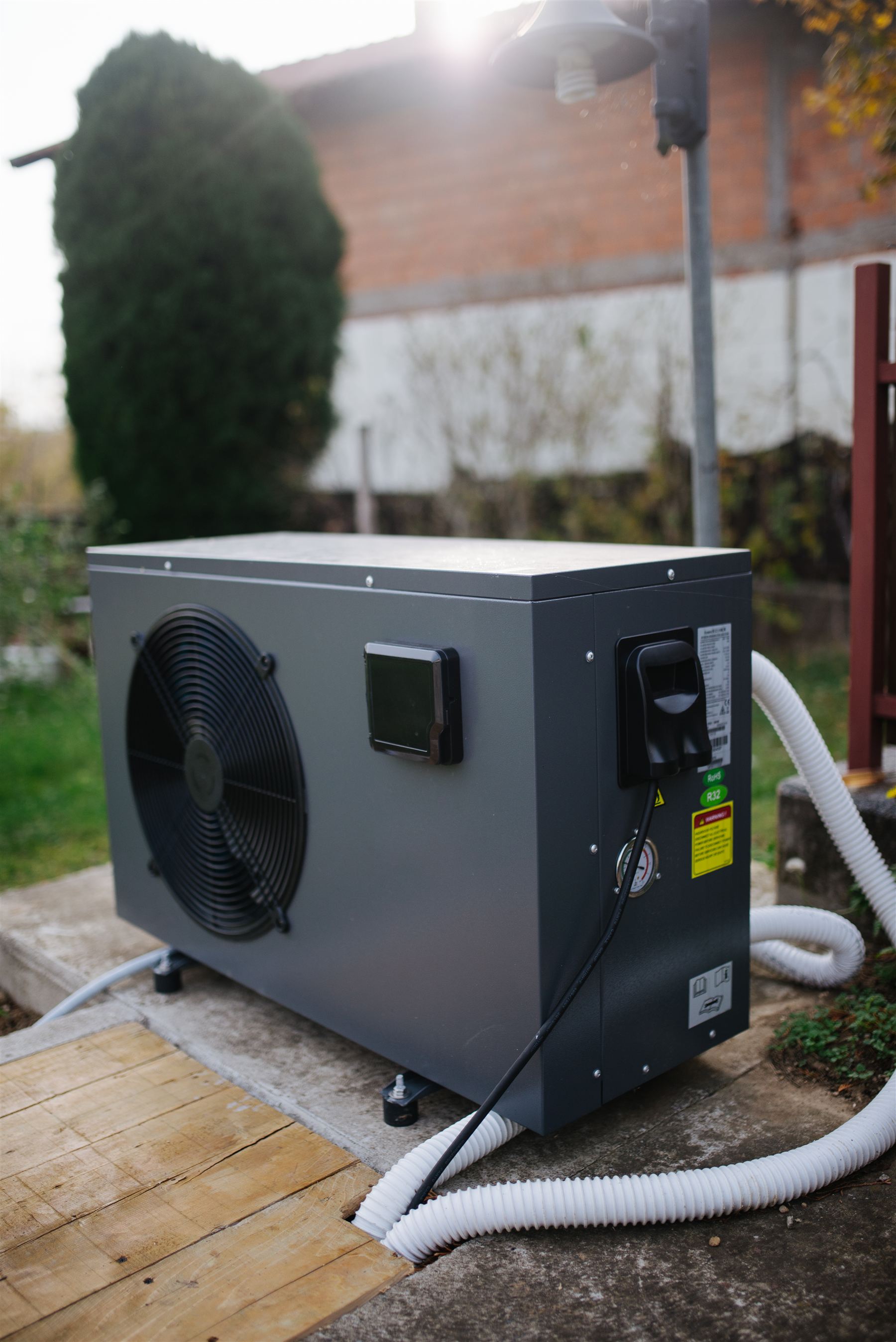 An outdoor condenser installed beside a home by All Counties Refrigeration, LLC, Carson City